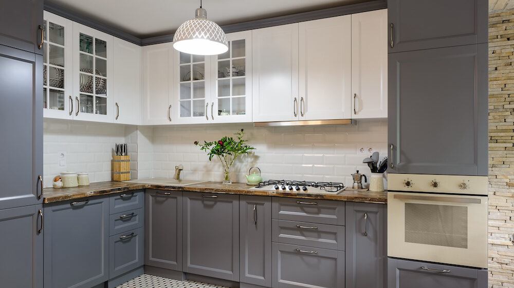 interior of modern luxury grey and white wooden kitchen